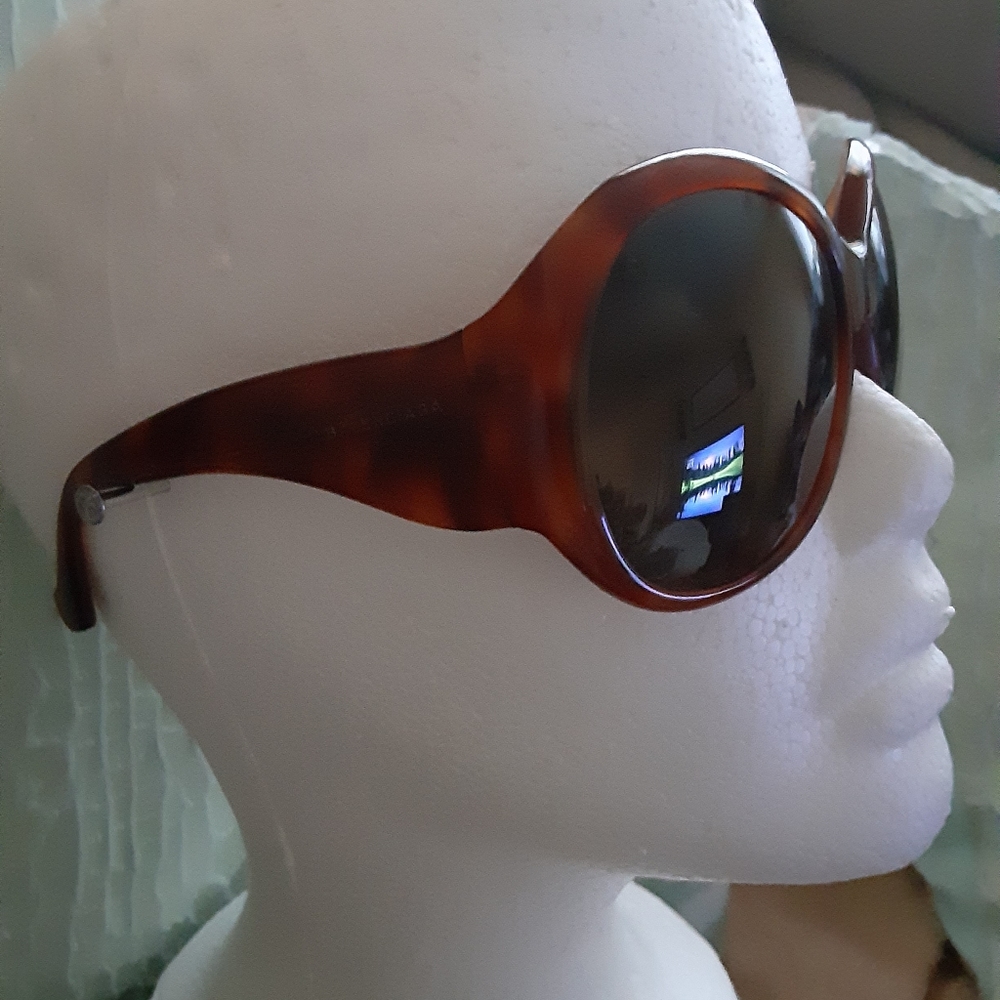 Balenciaga cognac colored green tinted sunglasses